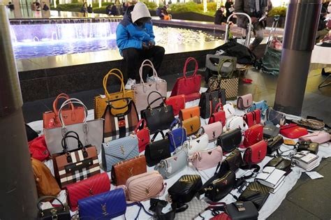 women who buy counterfeit bags.